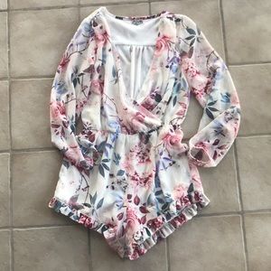 Floral romper long sleeve ruffle bottom